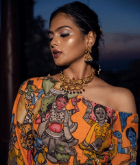 Orange Kalamkari Off Shoulder Blouse with Black Raw Silk Lehenga