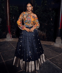 Orange Kalamkari Off Shoulder Blouse with Black Raw Silk Lehenga