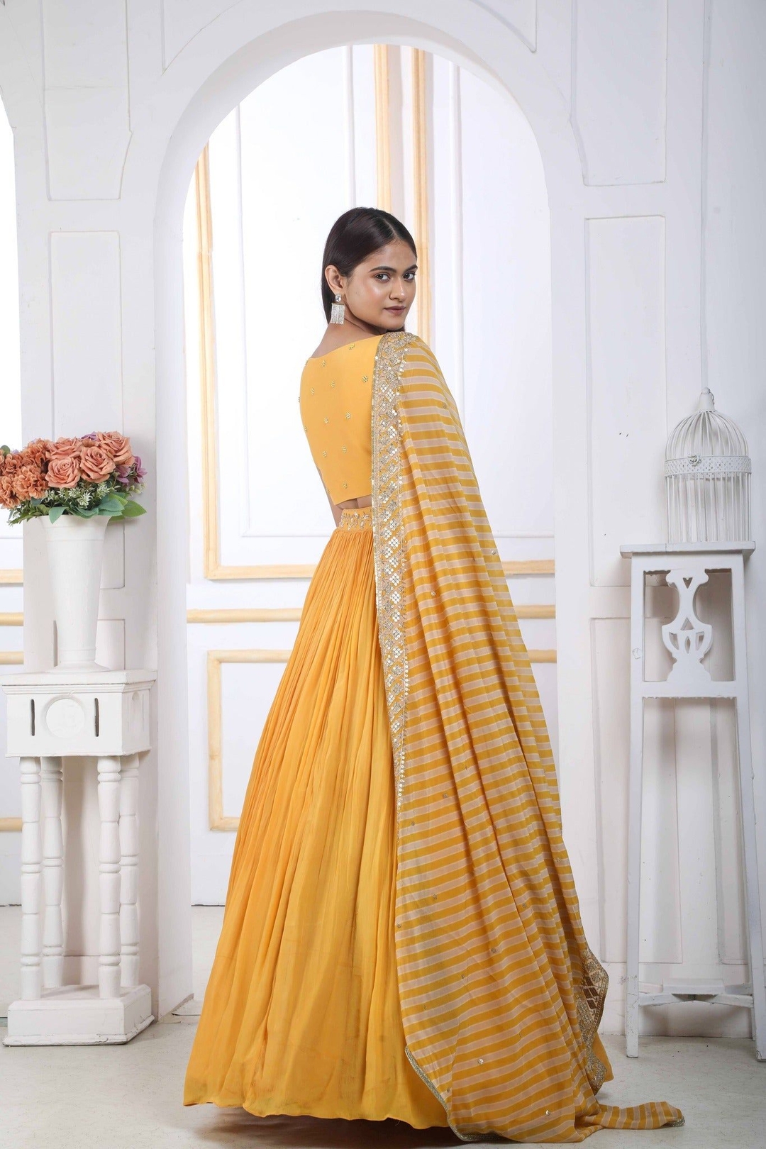 Mustard Yellow Lehenga Choli With Handwork Blouse And A Georgette Dupatta